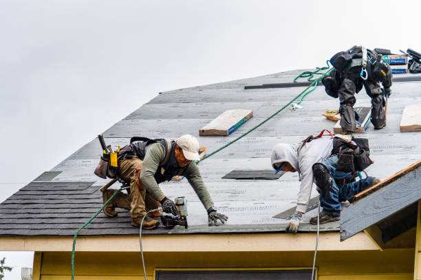 Professional Gutter Installation technician working in Rockport, MA
